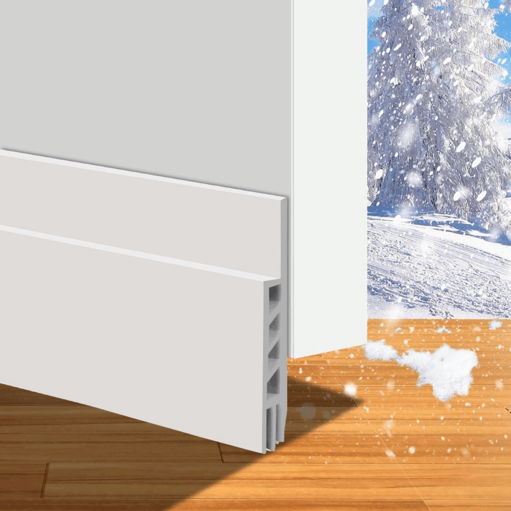 Installing door sweep to block snow and drafts indoors