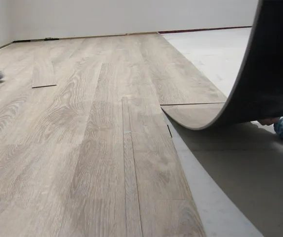 Installing vinyl plank flooring over smooth concrete subfloor