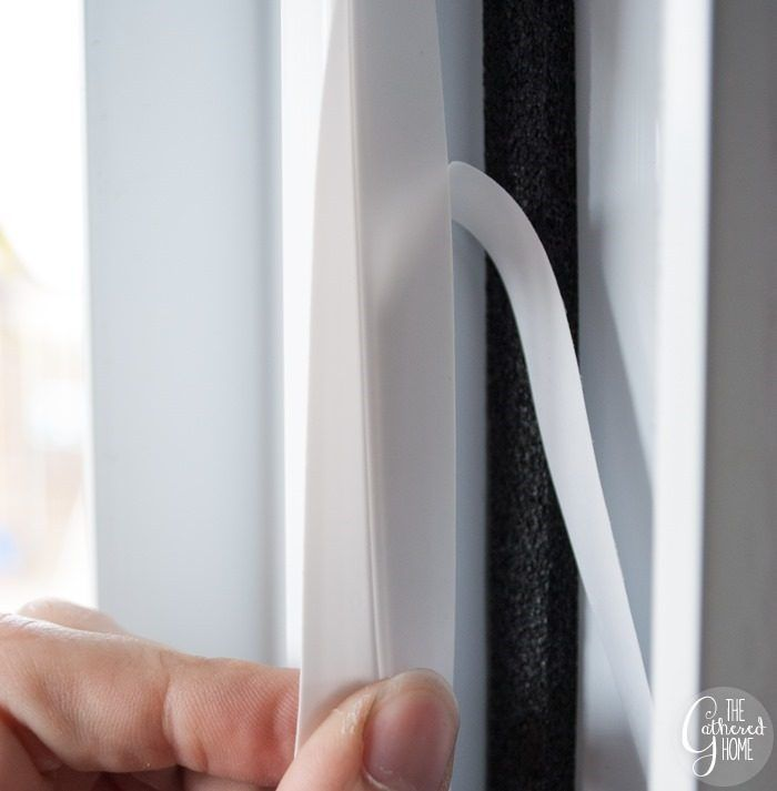 Installing weatherstripping seal on plastic vinyl window frame