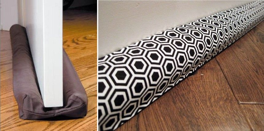 Fabric door draft stopper blocking cold air from enterin