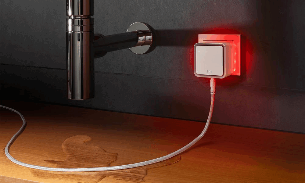 Smart leak detector under sink with red warning light